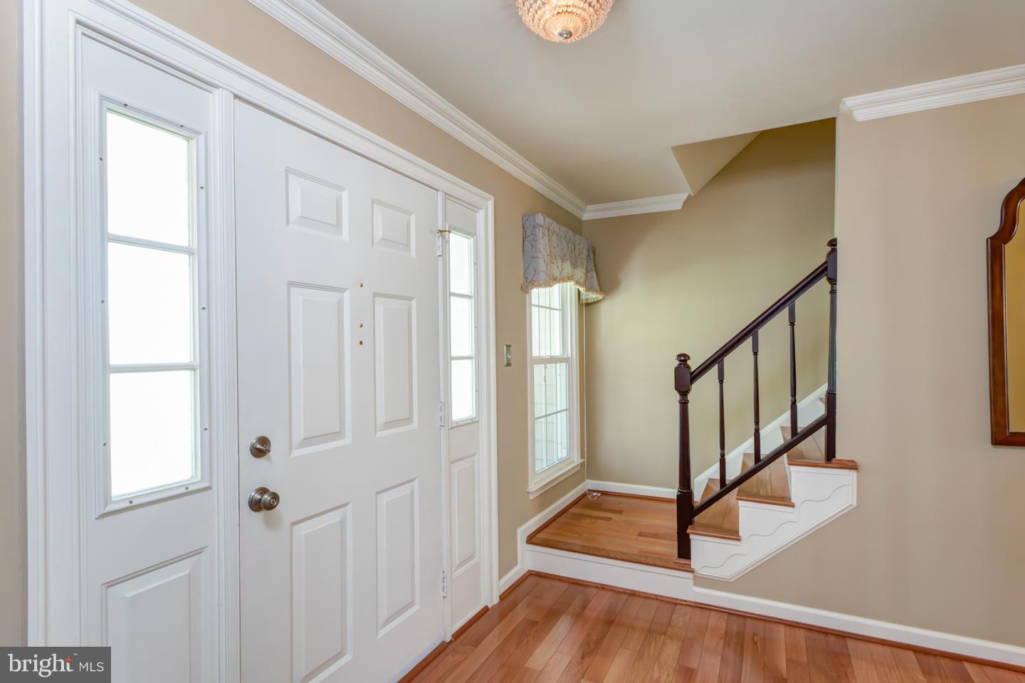 New hardwood flooring throughout, including stairs