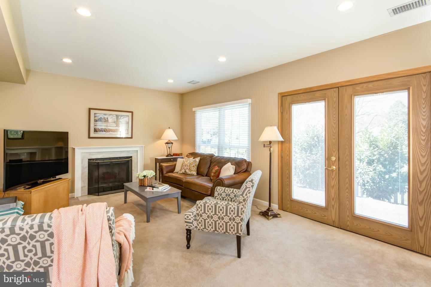 13322 Point Rider Lane Herndon, VA 20171 - Photo 8 of 28 Family room with French doors leading to patio