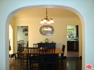 a bedroom with bed and window