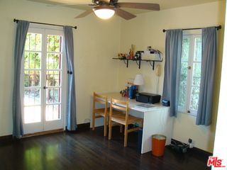 a bathroom with a sink toilet and mirror