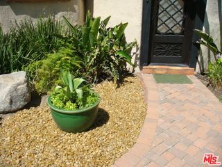a view of swimming pool with a yard