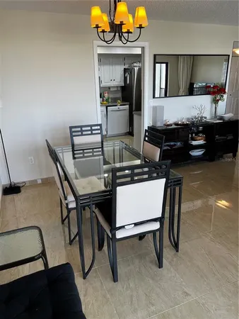 a room with furniture and a chandelier