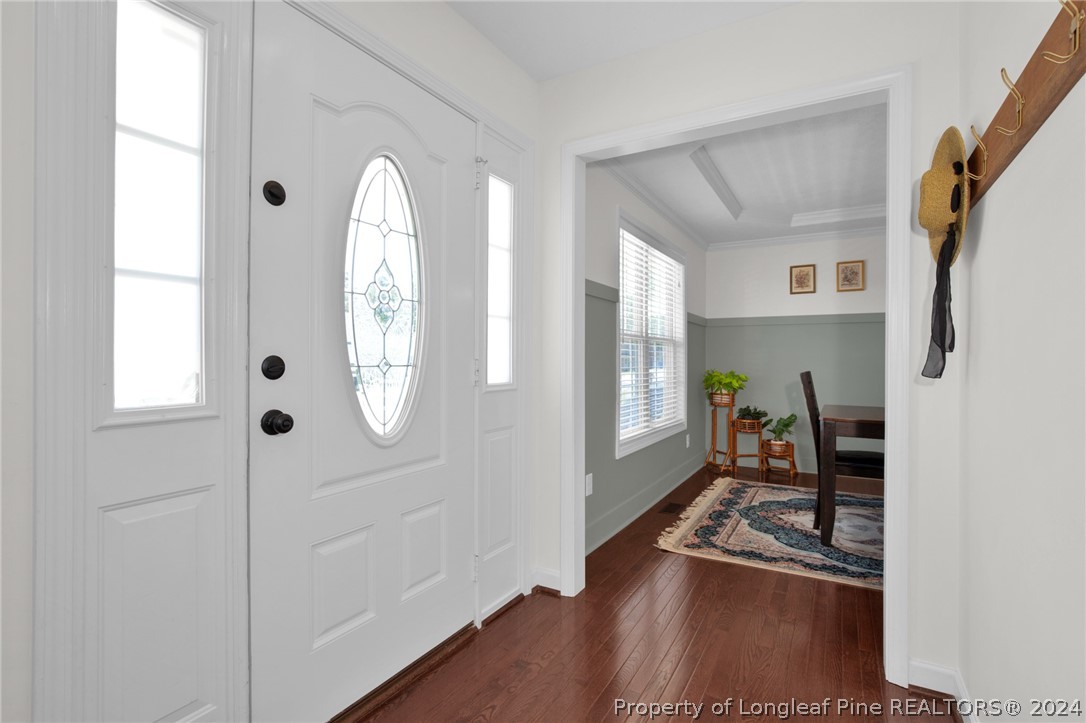 101 Lattimore Road Cameron, NC 28326 - Photo 4 of 33 a view of a livingroom with wooden floor and a window