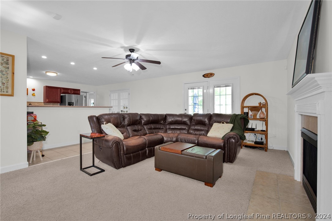 101 Lattimore Road Cameron, NC 28326 - Photo 5 of 33 a living room with furniture and a fireplace