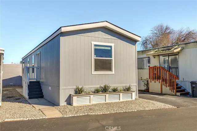 a front view of a house with garage