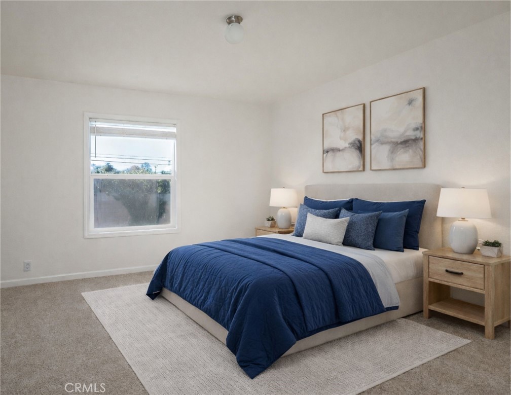 3210 Santa Maria Way, Unit 21 Santa Maria, CA 93455 - Photo 11 of 13 a bedroom with a bed and a window