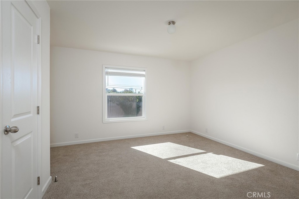3210 Santa Maria Way, Unit 21 Santa Maria, CA 93455 - Photo 12 of 13 an empty room with a window