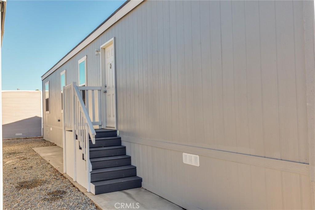 3210 Santa Maria Way, Unit 21 Santa Maria, CA 93455 - Photo 3 of 13 a view of a hallway with staircase