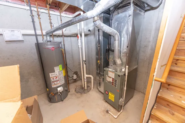 a view of living room with furniture and a window