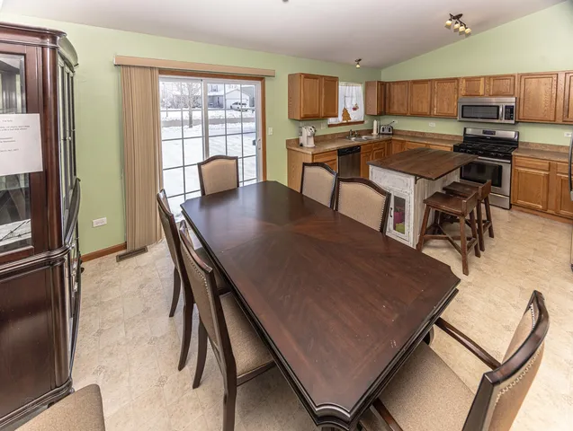 a view of a dining room with furniture
