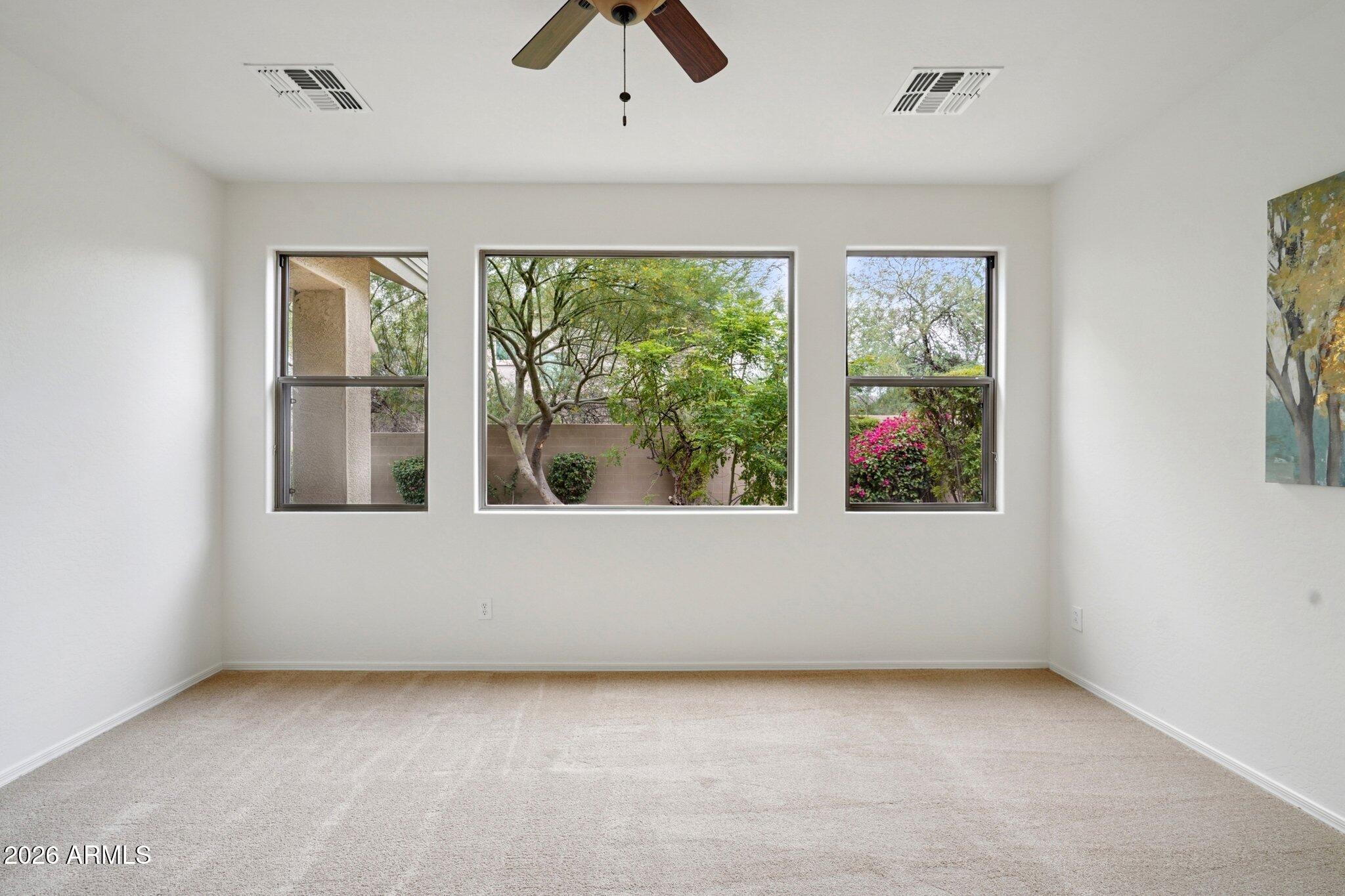 3852 West Ranier Court Anthem, AZ 85086 - Photo 17 of 58 an empty room with window