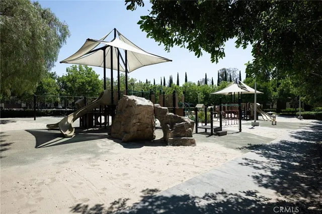 a view of a park with a slide