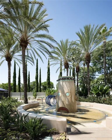 a swimming pool with outdoor seating and yard