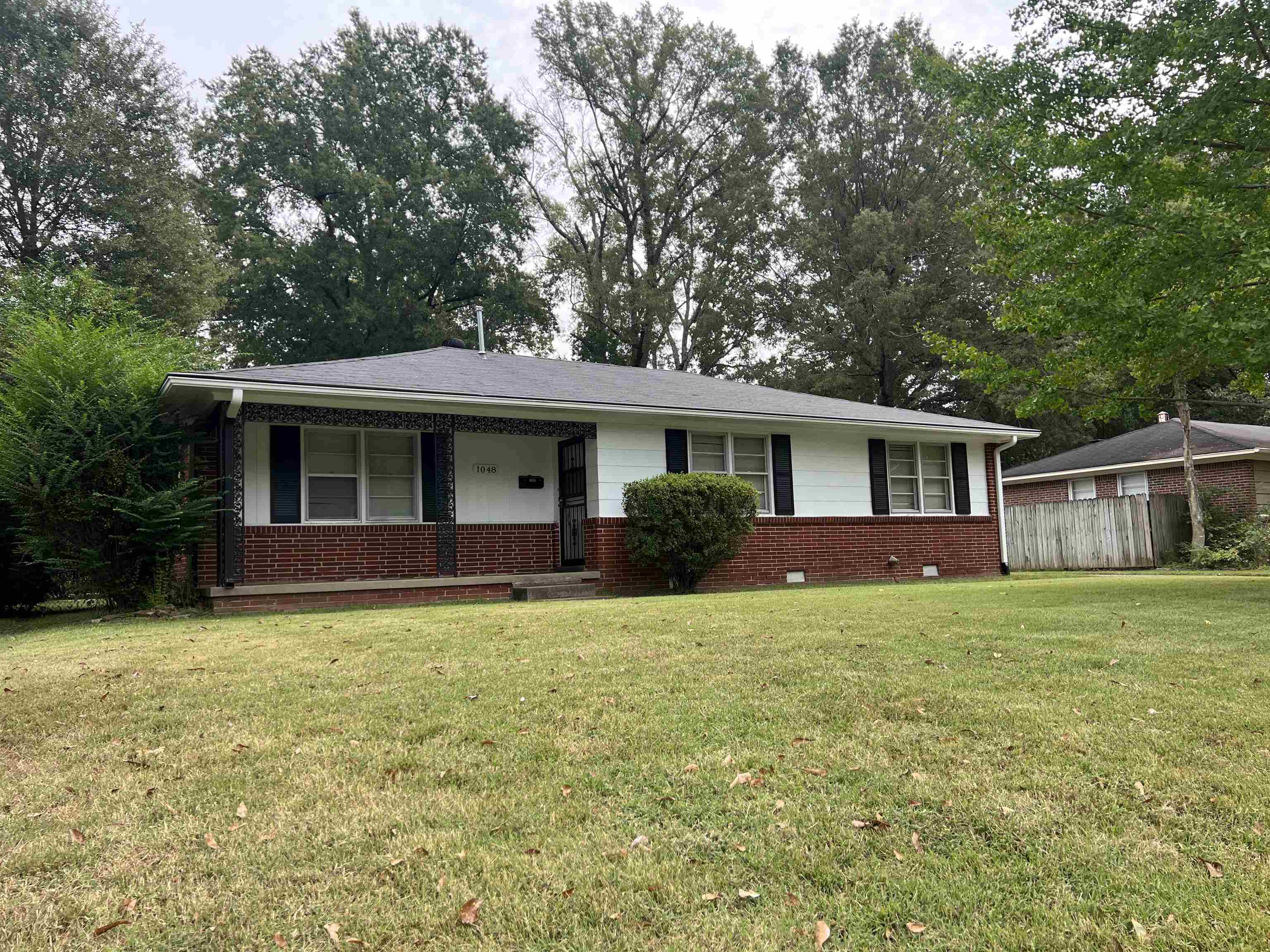 1048 West Perkins Road Memphis, TN 38117 - Photo 1 of 15 a view of a house with a yard