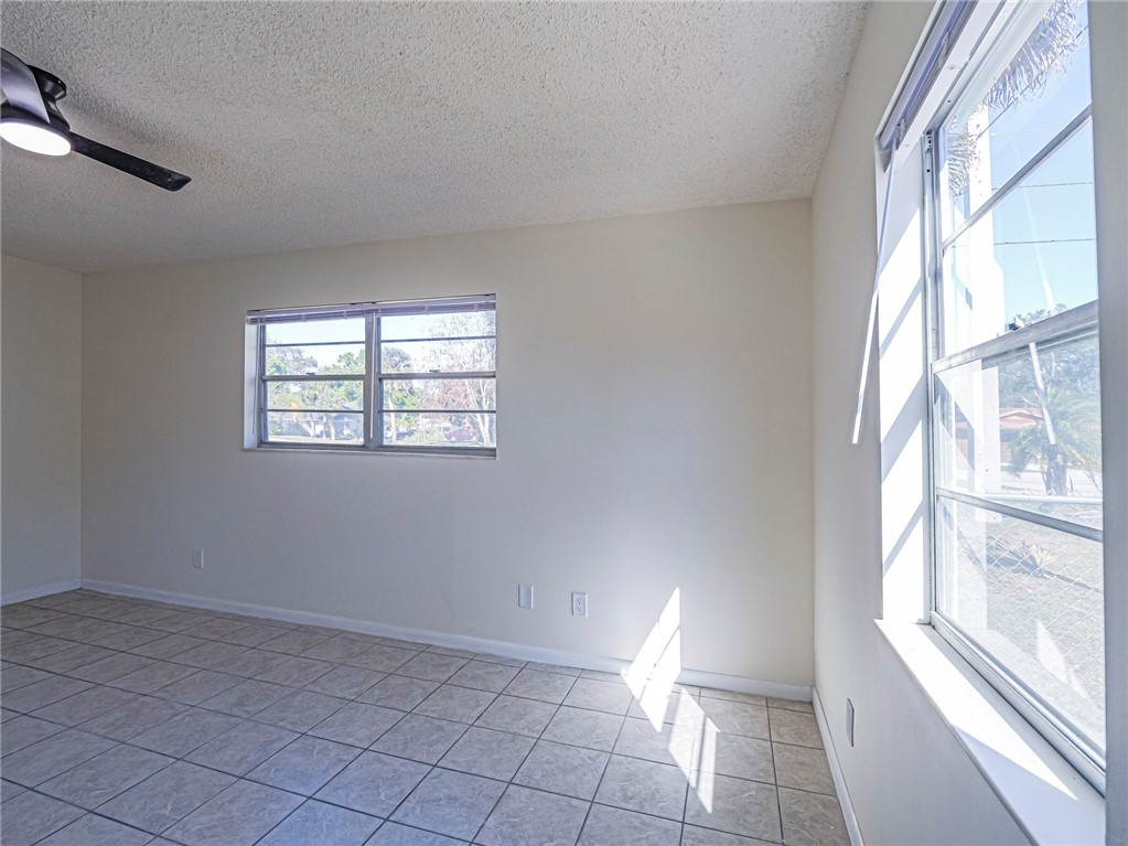 1331 Barber Street Sebastian, FL 32958 - Photo 12 of 32 a view of an empty room with a window
