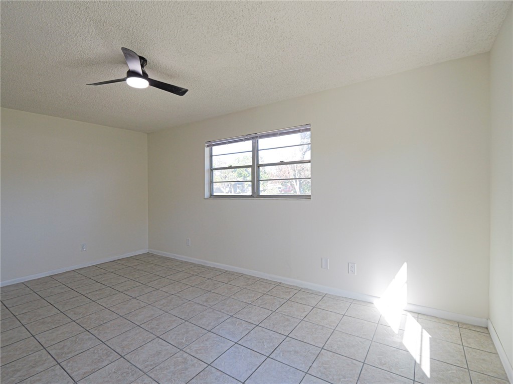 1331 Barber Street Sebastian, FL 32958 - Photo 13 of 32 an empty room with windows