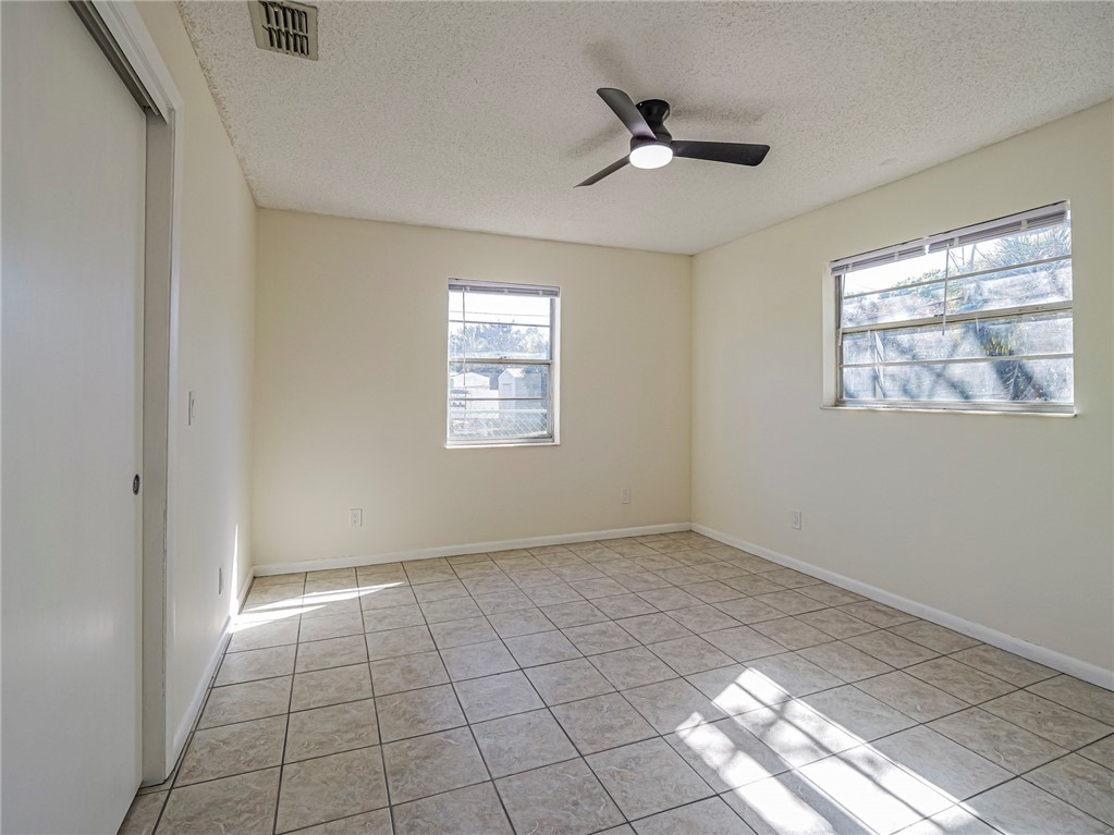 1331 Barber Street Sebastian, FL 32958 - Photo 17 of 32 a view of an empty room with a window