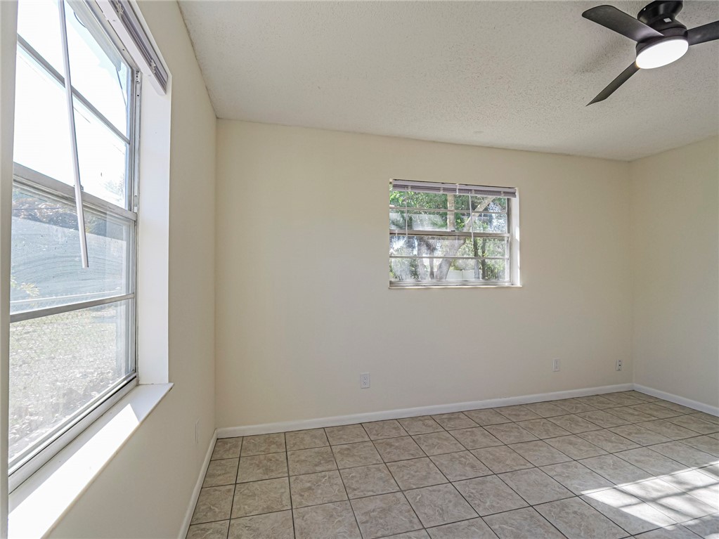1331 Barber Street Sebastian, FL 32958 - Photo 19 of 32 an empty room with windows