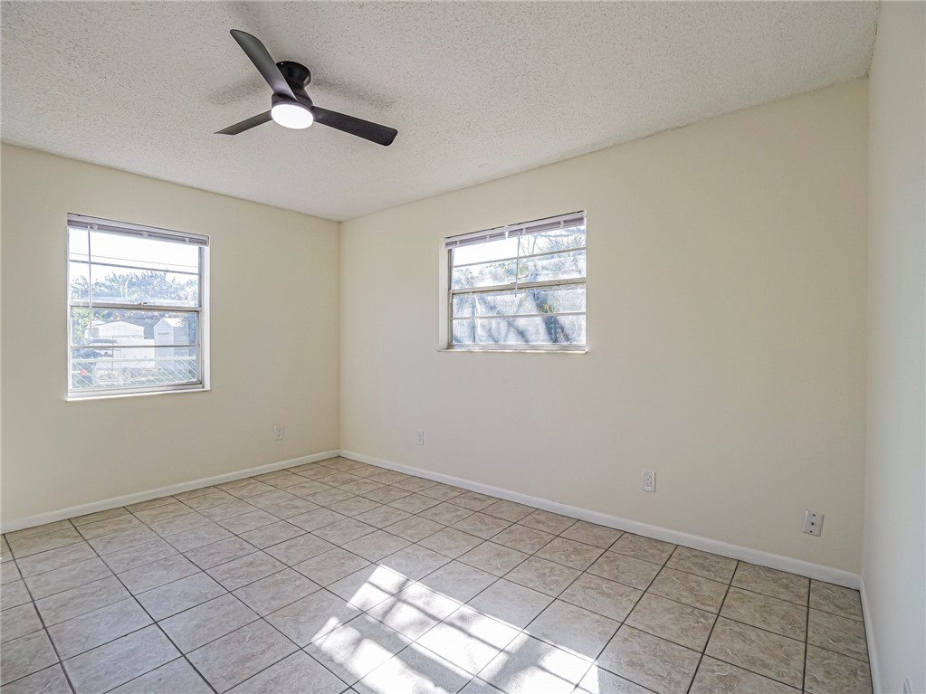 1331 Barber Street Sebastian, FL 32958 - Photo 20 of 32 a view of empty room with windows