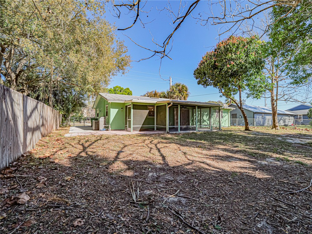 1331 Barber Street Sebastian, FL 32958 - Photo 26 of 32 a front view of a house with a yard