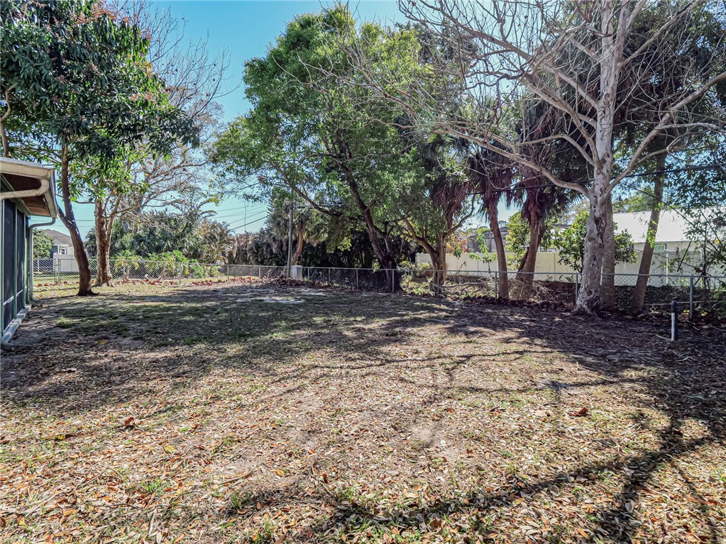 1331 Barber Street Sebastian, FL 32958 - Photo 27 of 32 a view of a tree in the middle of a yard
