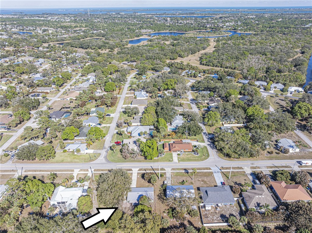 1331 Barber Street Sebastian, FL 32958 - Photo 32 of 32 an aerial view of residential houses with outdoor space
