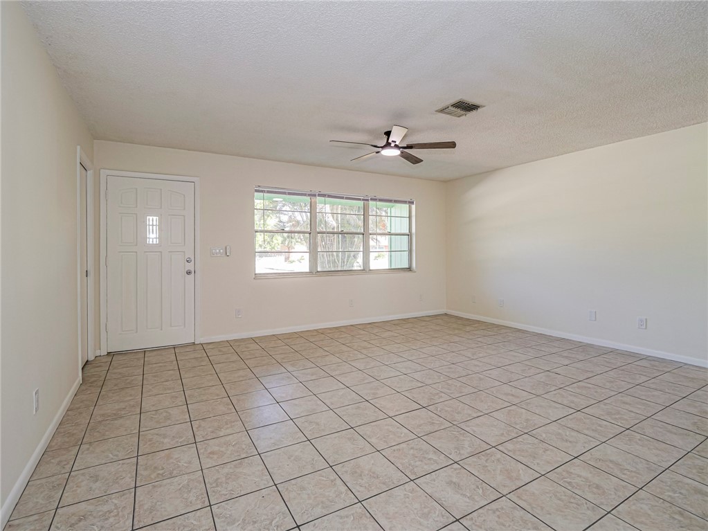 1331 Barber Street Sebastian, FL 32958 - Photo 4 of 32 a view of an empty room with a window