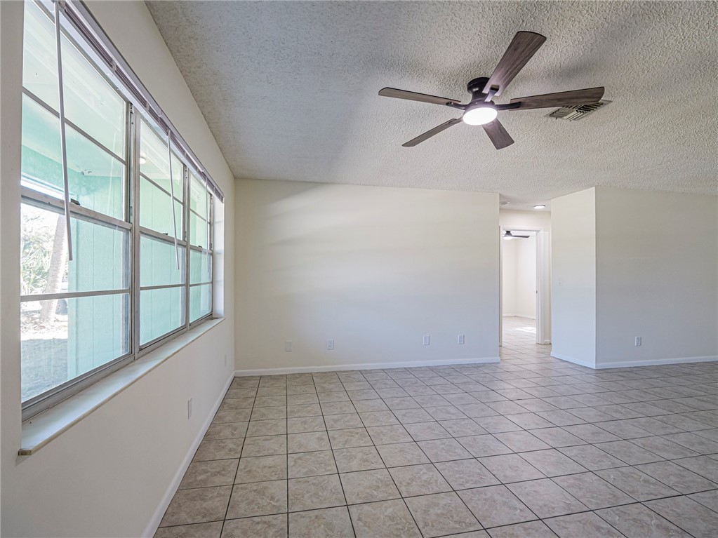 1331 Barber Street Sebastian, FL 32958 - Photo 5 of 32 a view of an empty room with a window