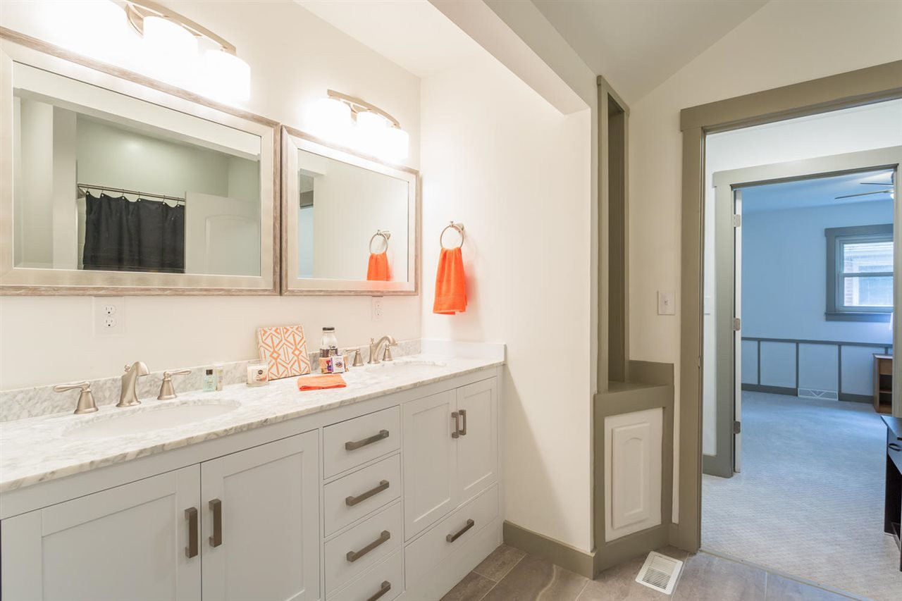 409 Stacy Street Raleigh, NC 27607 - Photo 20 of 25 This central bathroom will have your guests commenting, "WOW, this is a really nice house...would you mind showing me the rest of it?" Bathroom
