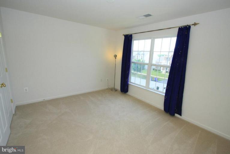 18604 Broken Oak Road Boyds, MD 20841 - Photo 3 of 18 a view of a room with a large window