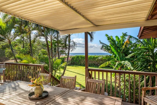 a view of balcony with wooden floor