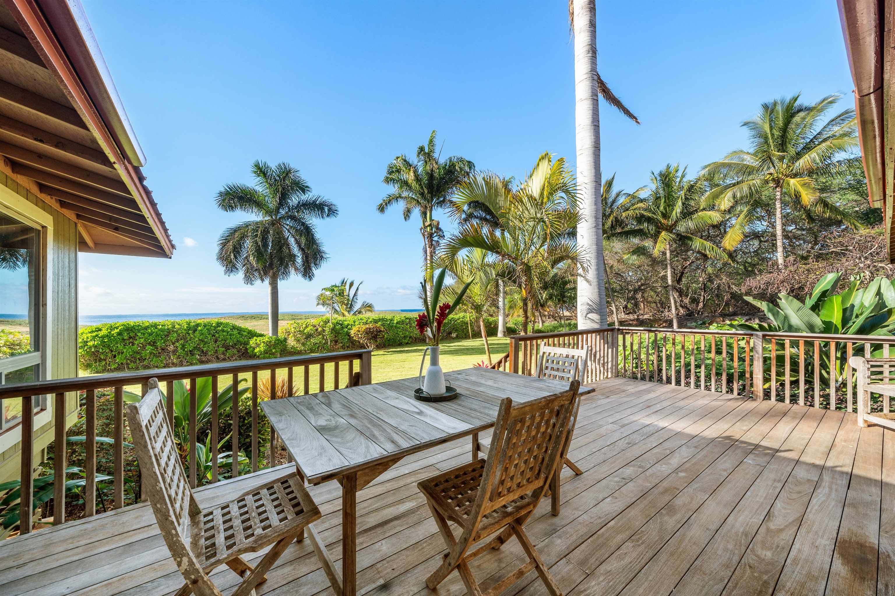 2944 Kalua Koi Road Maunaloa, HI 96770 - Photo 21 of 47 a view of a patio with a table and chairs