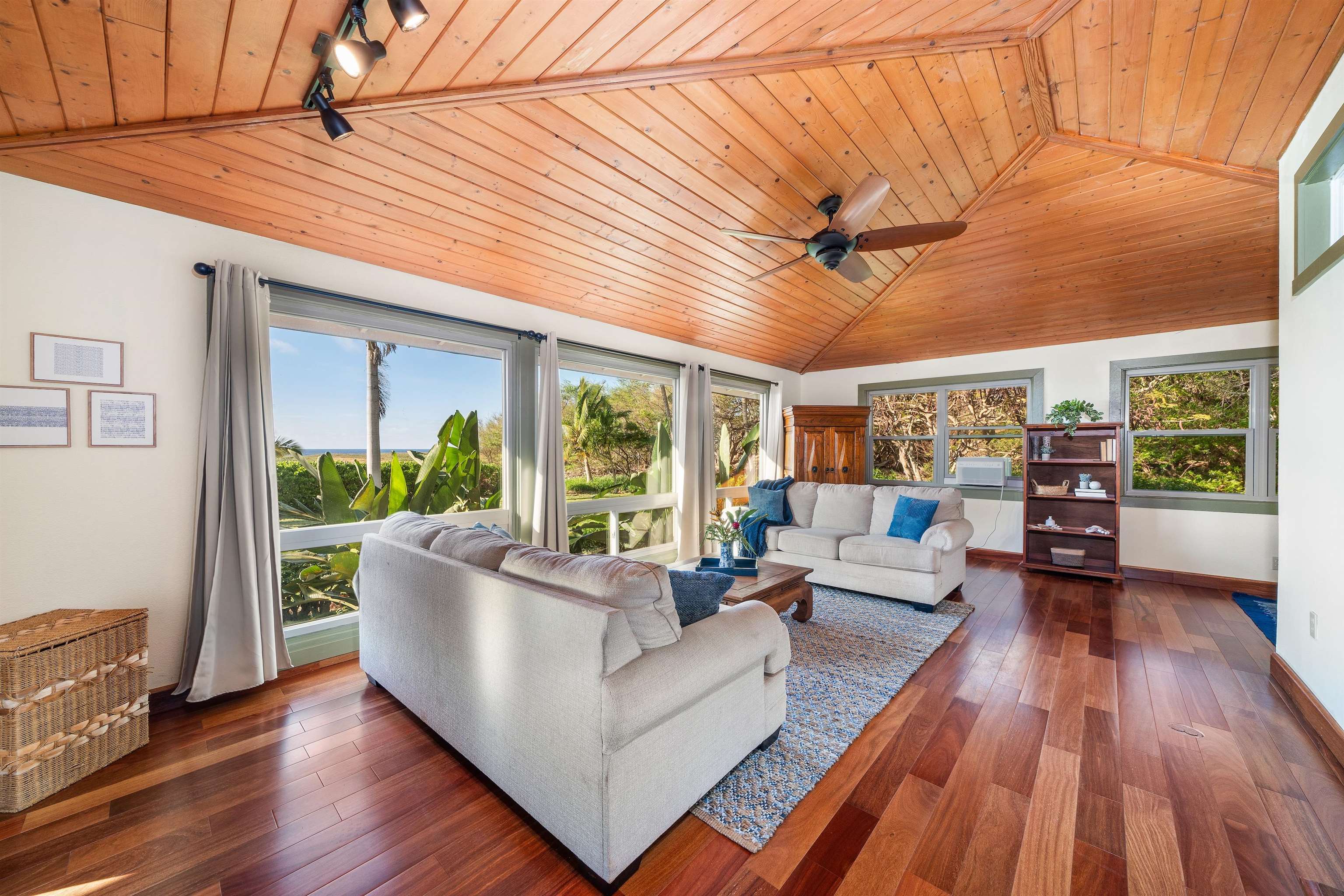 2944 Kalua Koi Road Maunaloa, HI 96770 - Photo 26 of 47 a living room with furniture and a large window
