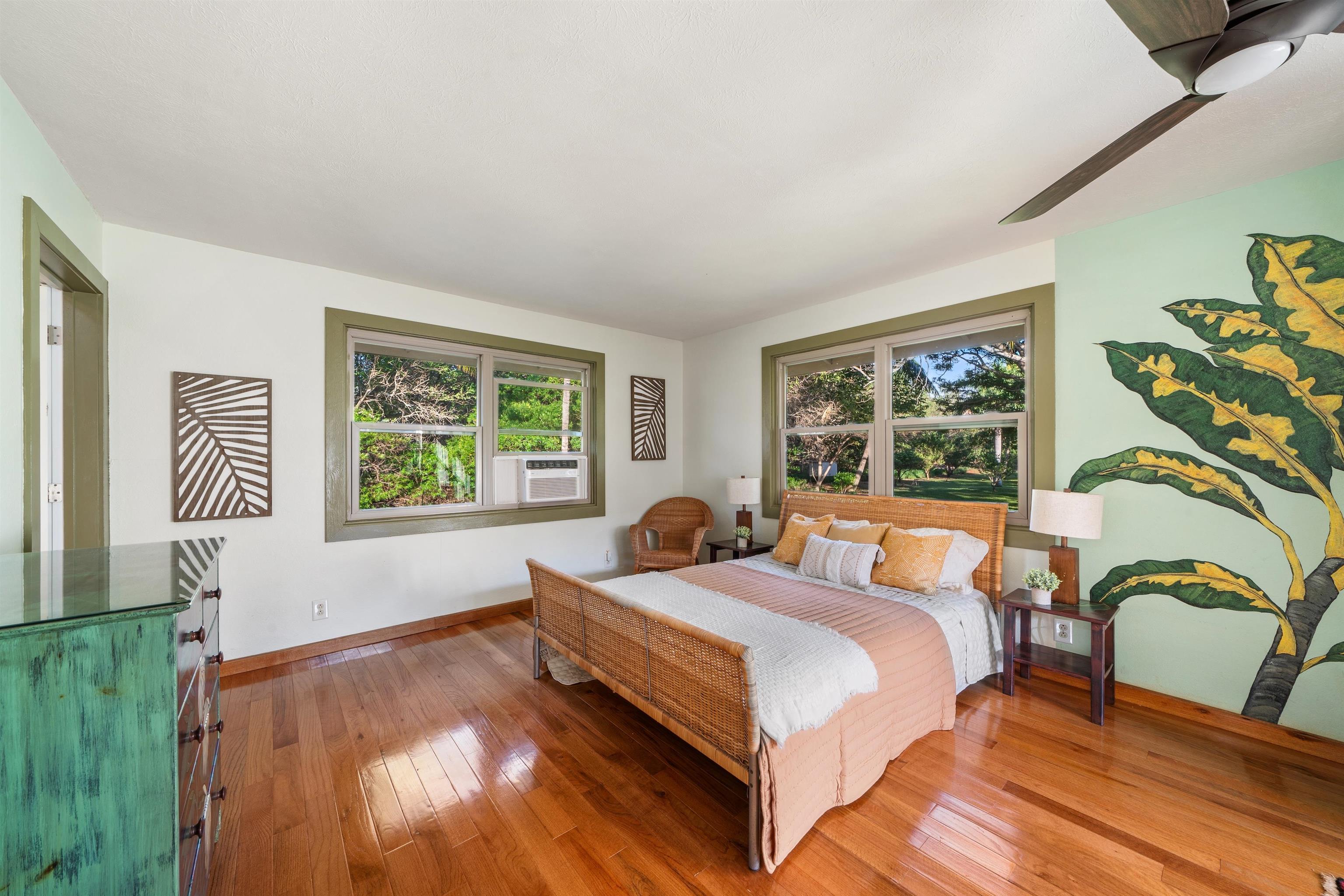 2944 Kalua Koi Road Maunaloa, HI 96770 - Photo 29 of 47 a bedroom with a bed and a window