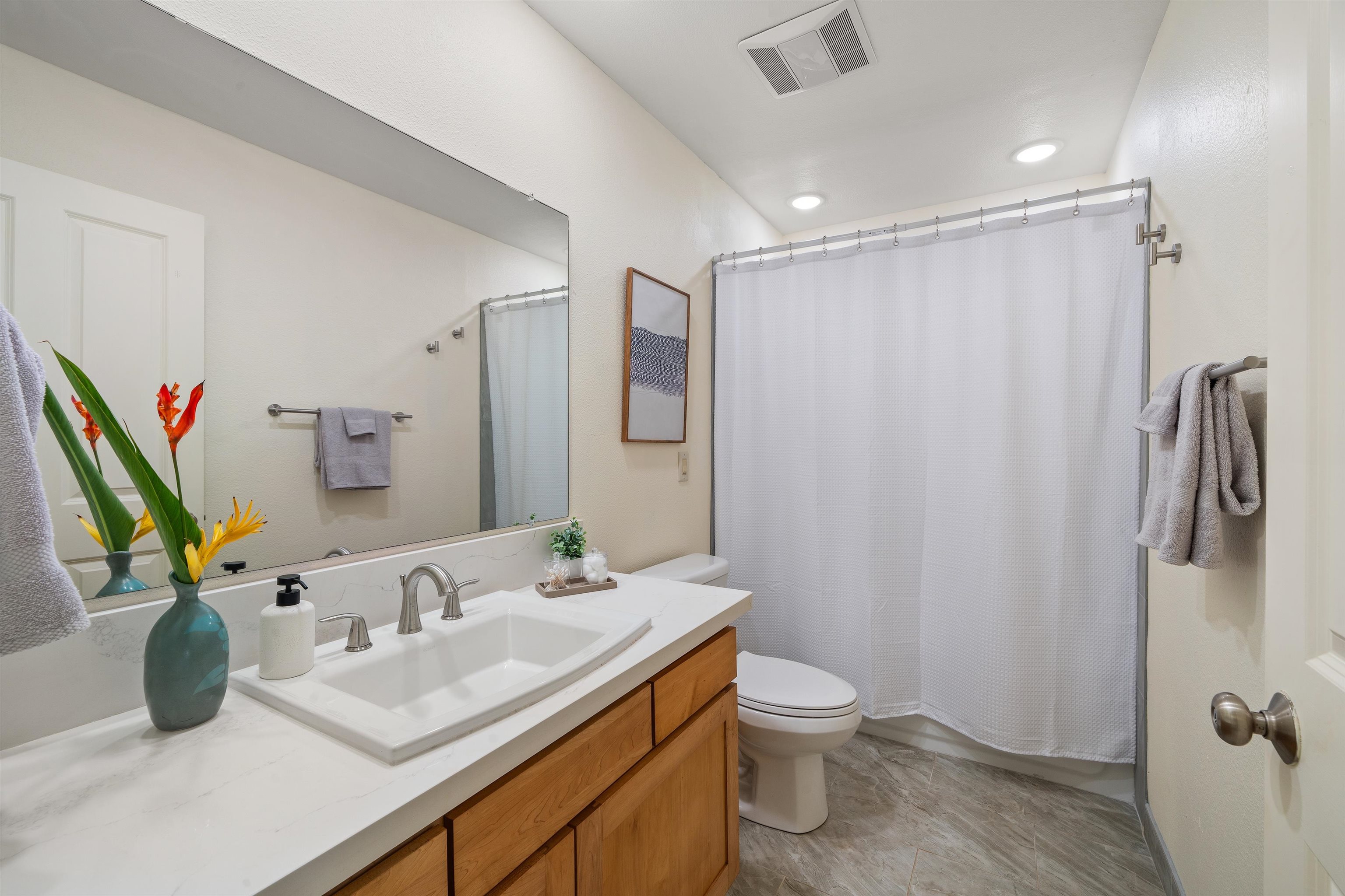 2944 Kalua Koi Road Maunaloa, HI 96770 - Photo 37 of 47 a bathroom with a granite countertop sink toilet and shower