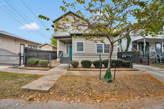front view of a house with a patio