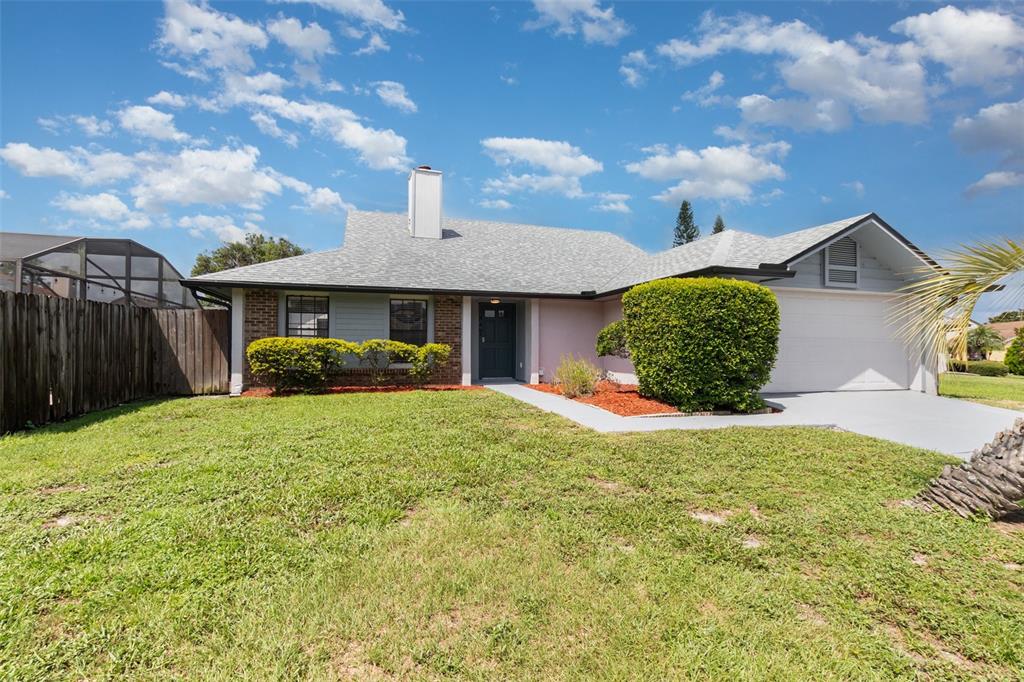 549 Silvergate Loop Lake Mary, FL 32746 - Photo 1 of 1 a front view of a house with a yard and garage