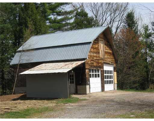 192 Chaplin Mills Road Naples, ME 04055 - Photo 17 of 19 Parking Lot/Garage. Oversized garage...