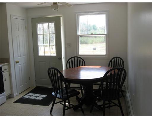 192 Chaplin Mills Road Naples, ME 04055 - Photo 7 of 19 Kitchen. Kitchen opens to wrap...