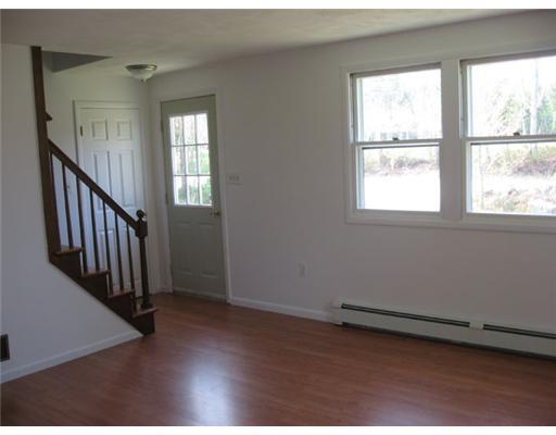 192 Chaplin Mills Road Naples, ME 04055 - Photo 8 of 19 Living Room. Bright and cheery...
