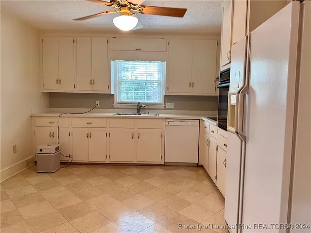 a view of a door and brick walls
