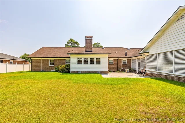 a view of a house with a big yard