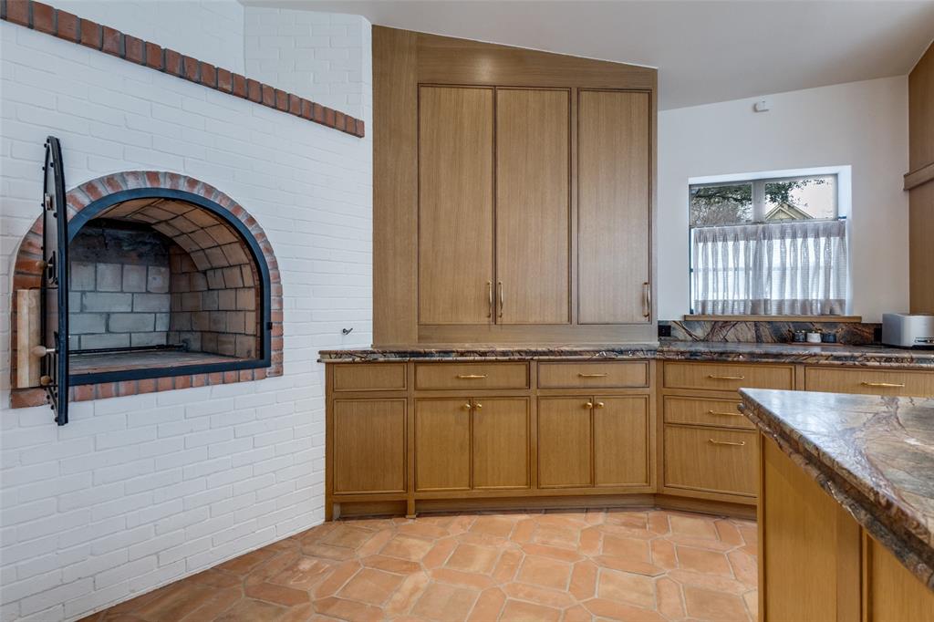 1308 San Rafael Drive Dallas, TX 75218 - Photo 18 of 40 a view of a kitchen with a sink and cabinets
