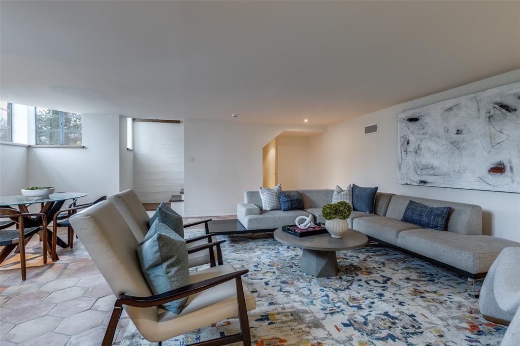 1308 San Rafael Drive Dallas, TX 75218 - Photo 21 of 40 a living room with furniture and wooden floor