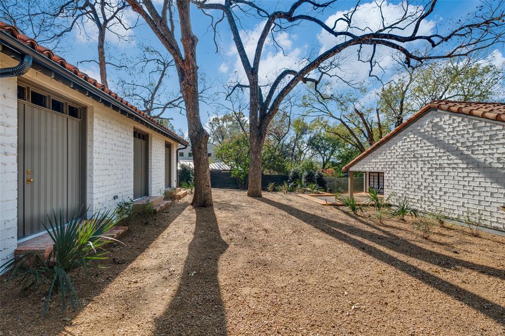 1308 San Rafael Drive Dallas, TX 75218 - Photo 35 of 40 a house view with a backyard space