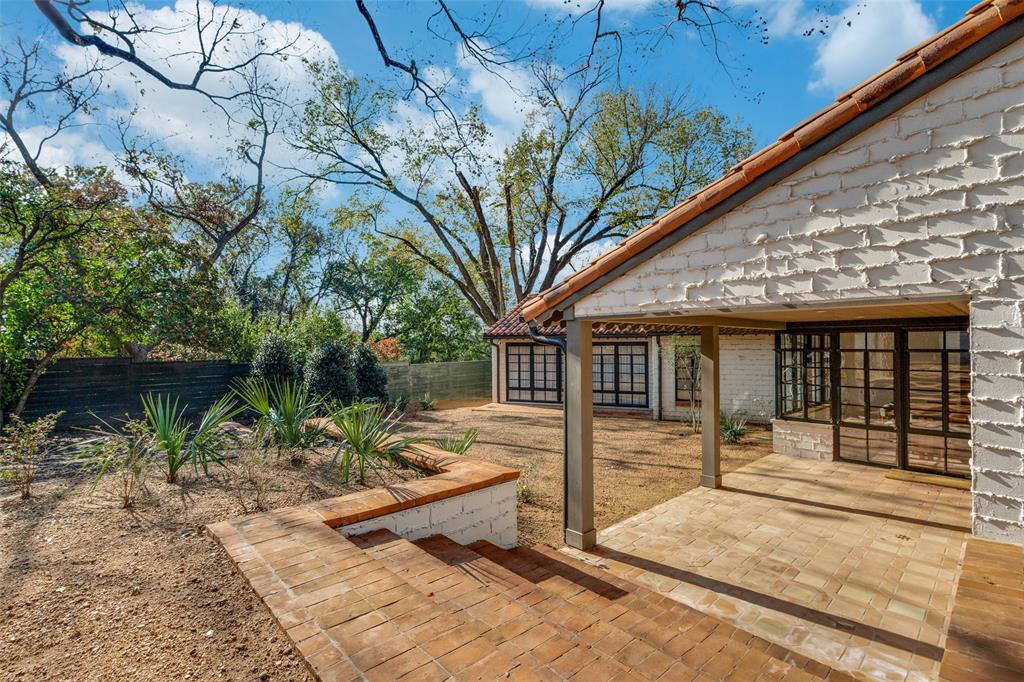 1308 San Rafael Drive Dallas, TX 75218 - Photo 36 of 40 a view of house with backyard and sitting area