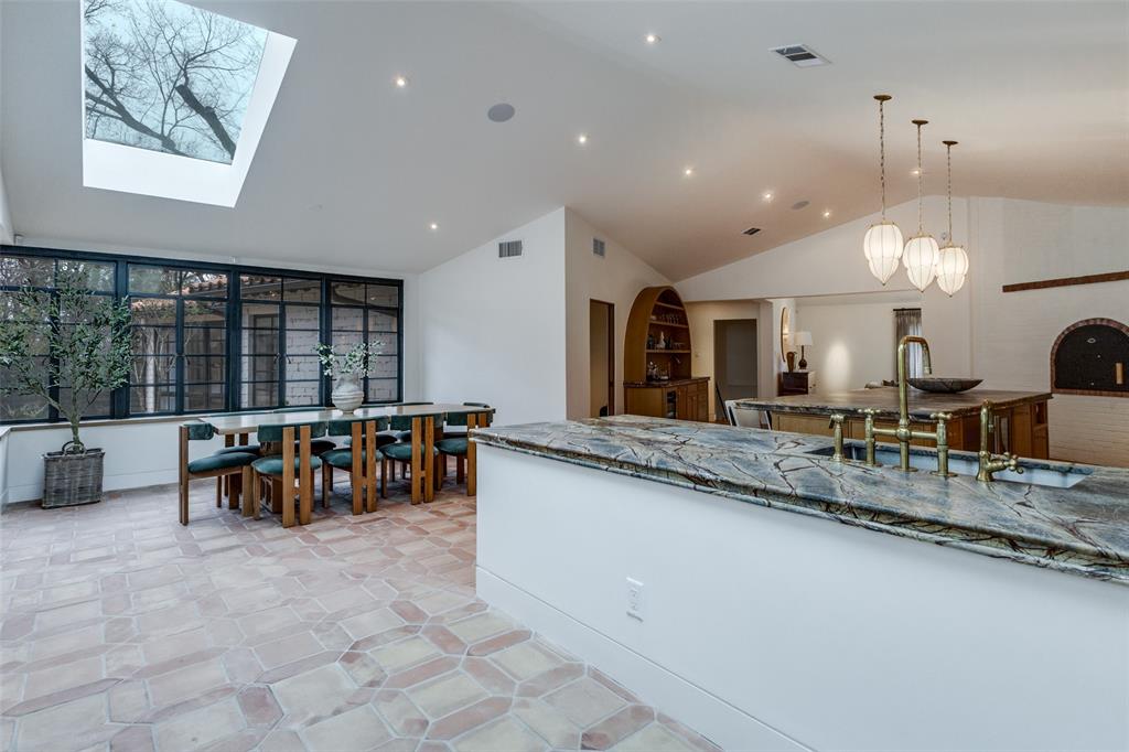 1308 San Rafael Drive Dallas, TX 75218 - Photo 9 of 40 a large kitchen with lots of counter space and a sink