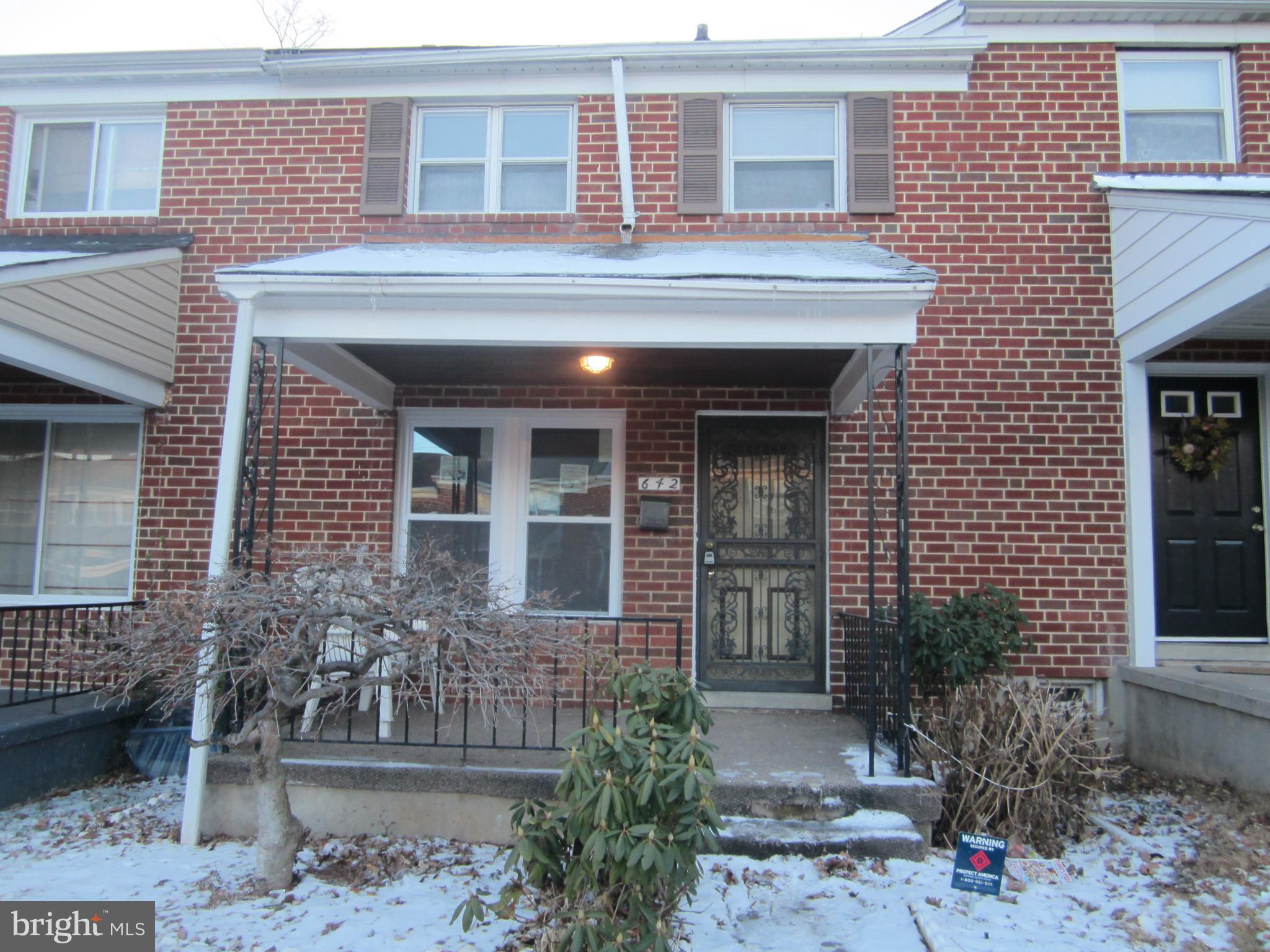 642 Brisbane Road Baltimore, MD 21229 - Photo 2 of 16 a front view of a house