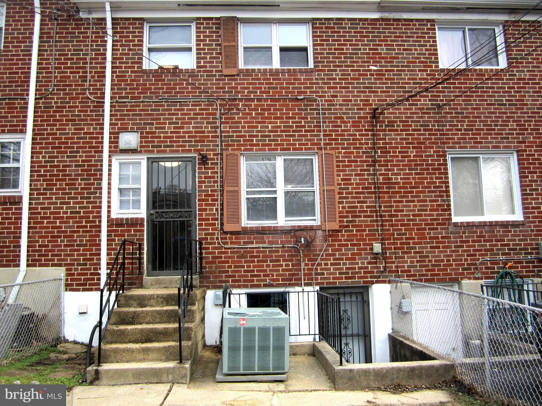 642 Brisbane Road Baltimore, MD 21229 - Photo 15 of 16 a front view of a building with a window
