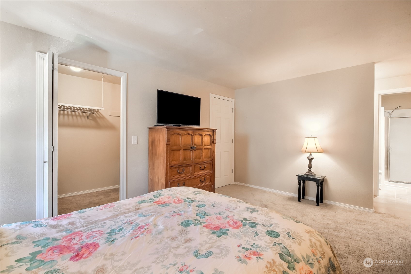 2003 Southwest 318th Place, Unit D8 Federal Way, WA 98023 - Photo 12 of 35 a bedroom with a bed and a television